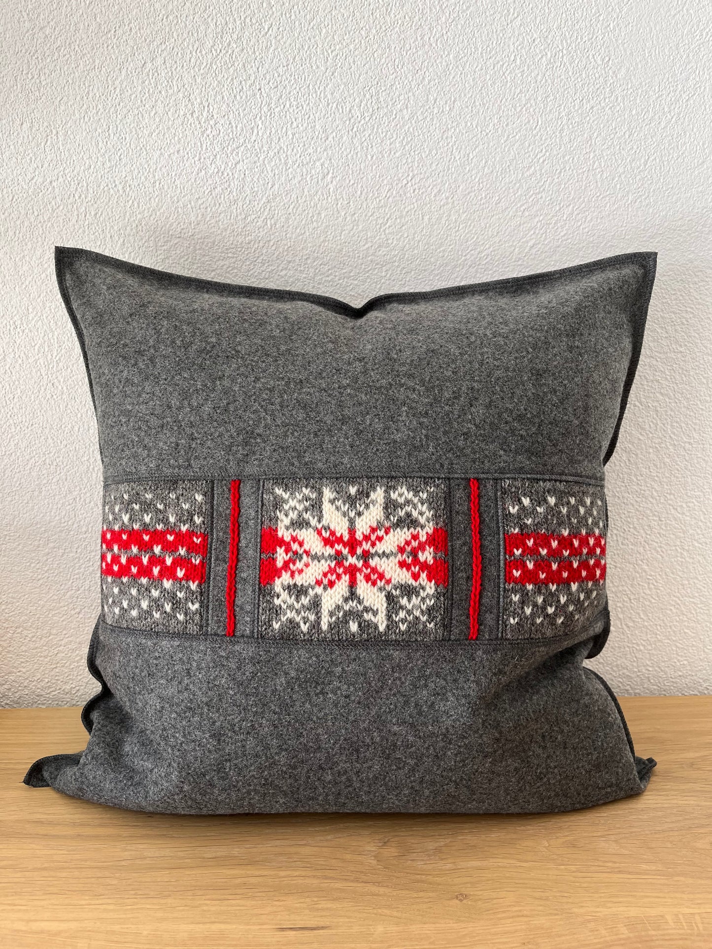 Cushion cover with handknitted details, red