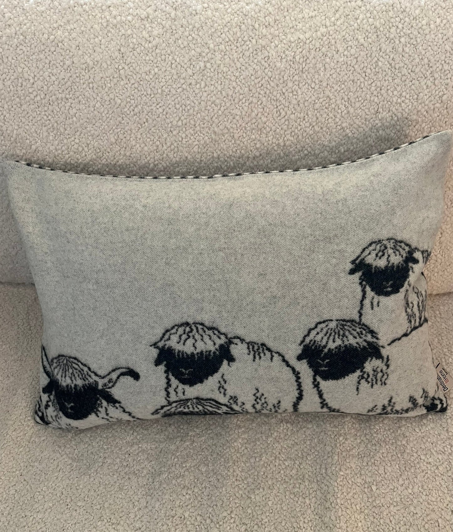 Blacknose sheep wool cushion cover, group of sheep