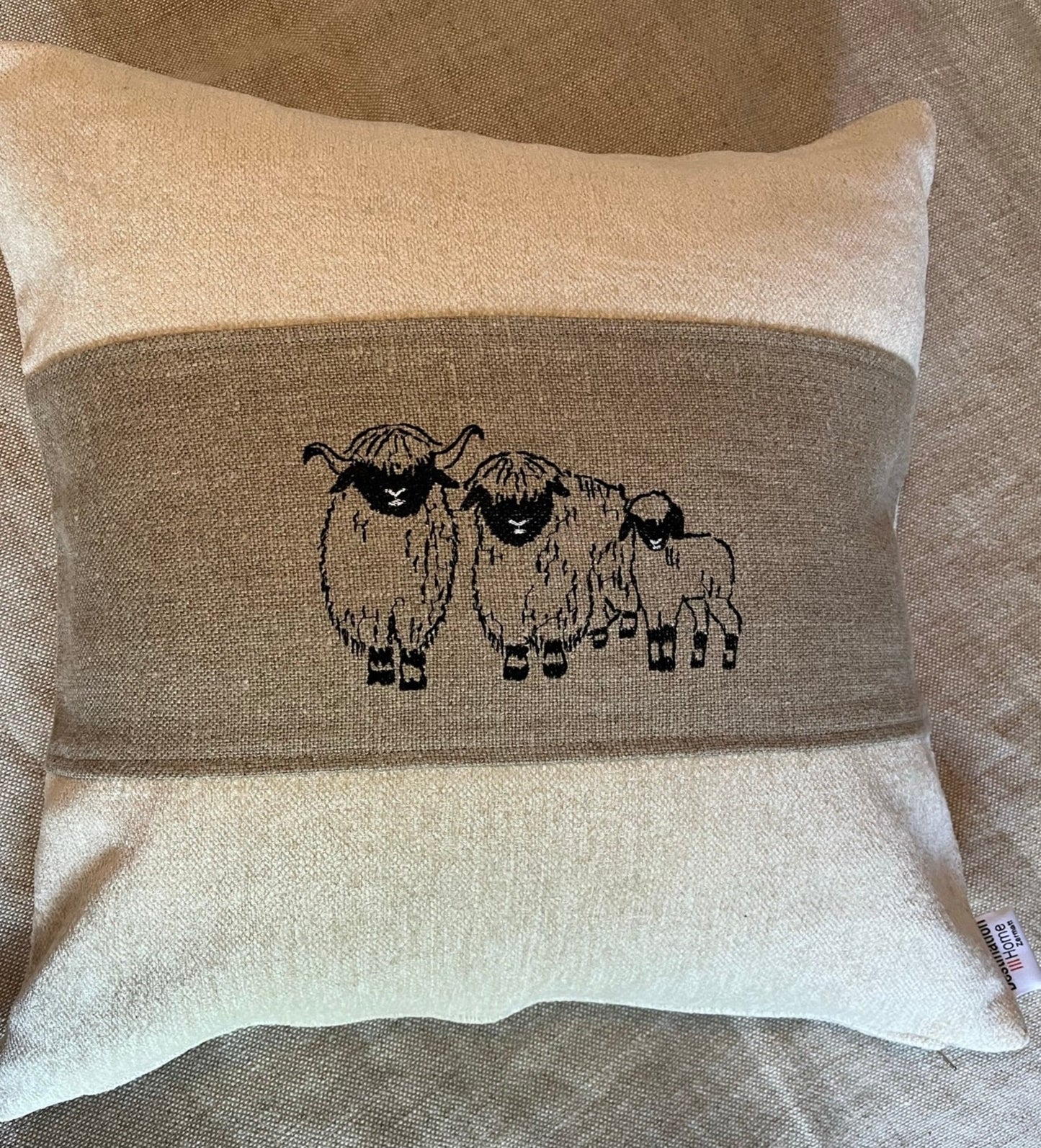 Blacknose Sheep cushion cover, three sheep, beige