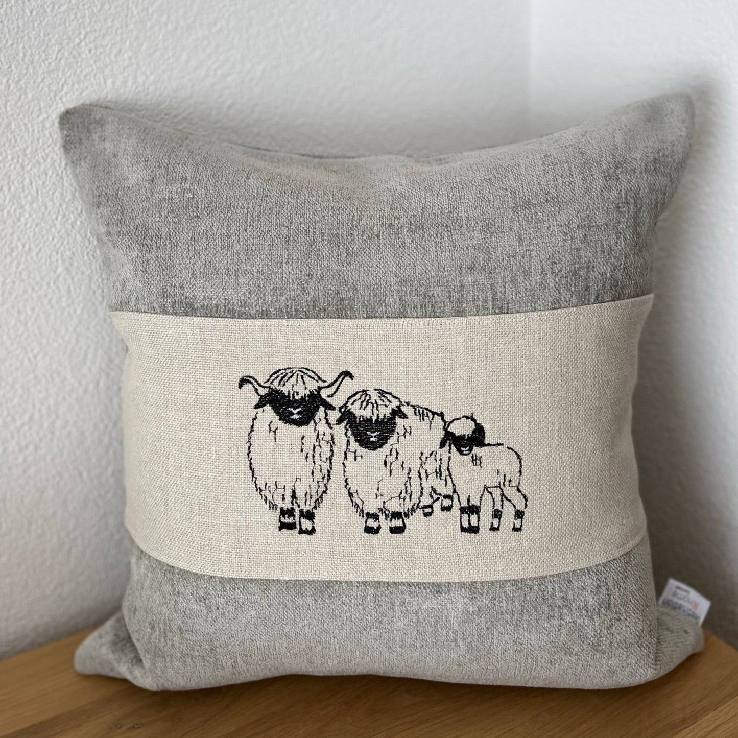 Blacknose Sheep cushion cover, three sheep, cream